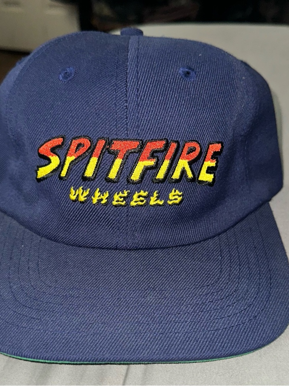 Spitfire Navy Cap with Red-to-Yellow Embroidered Logo